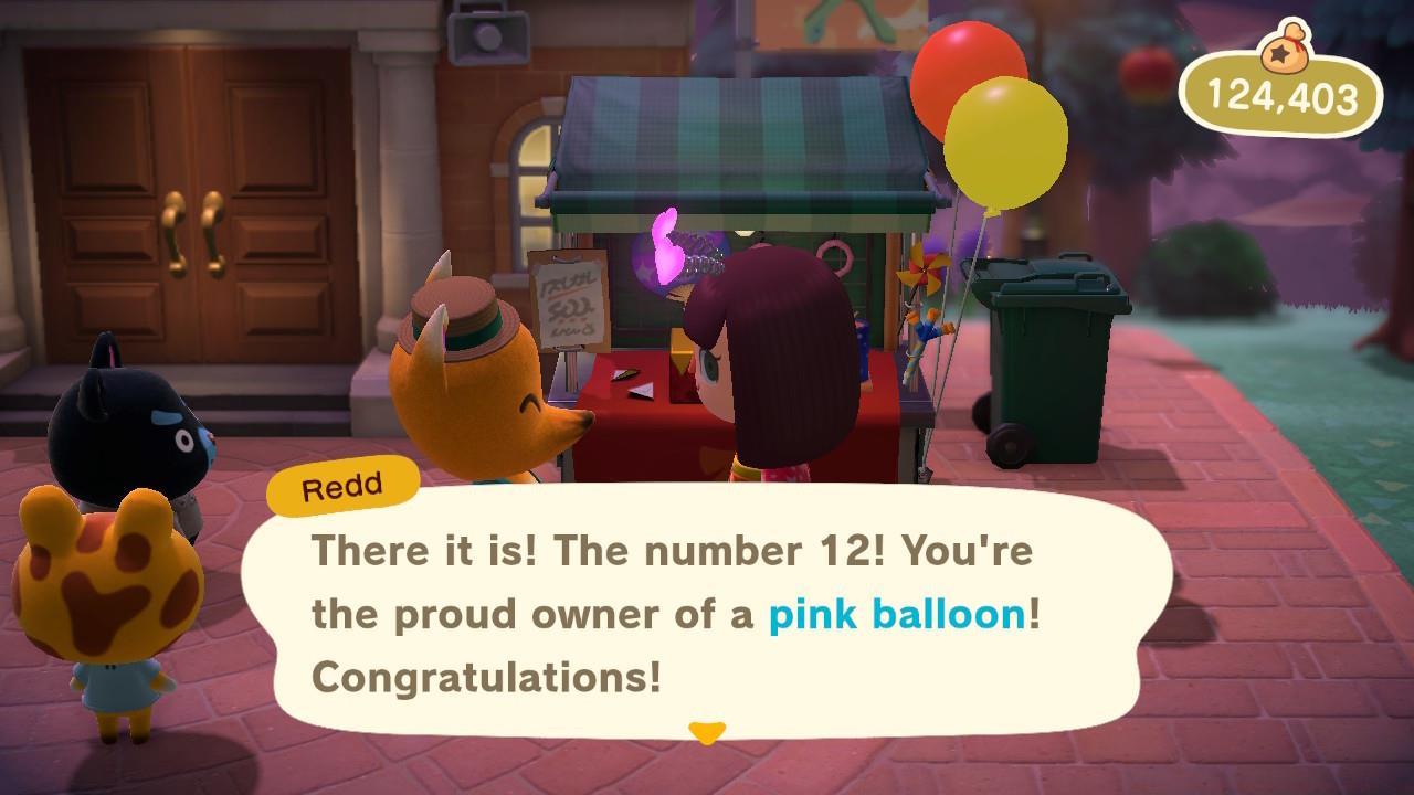 Winning prizes at Redd's Raffle cart in Animal Crossing: New Horizons. Hamphrey looks like he wants in on the action.
