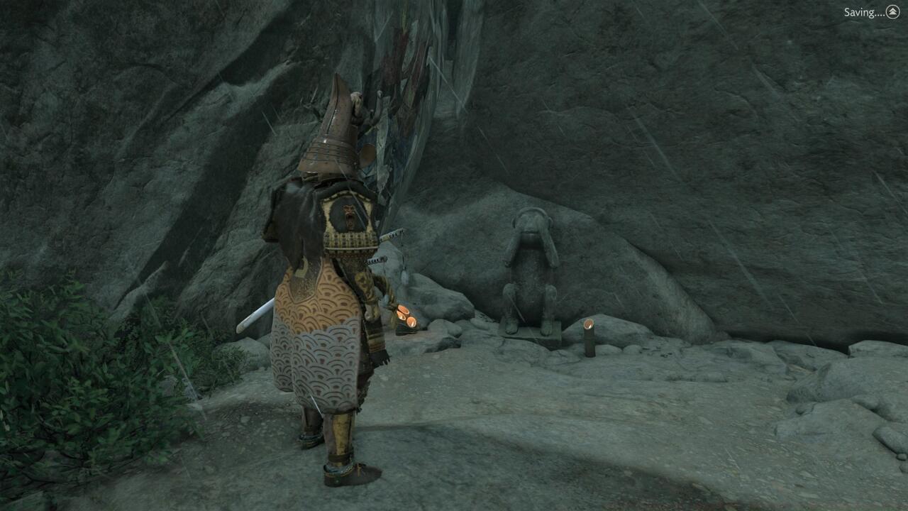 The second monkey statue is off the path to the right, where you can climb down. Throw a smoke bomb in front of it to activate it.