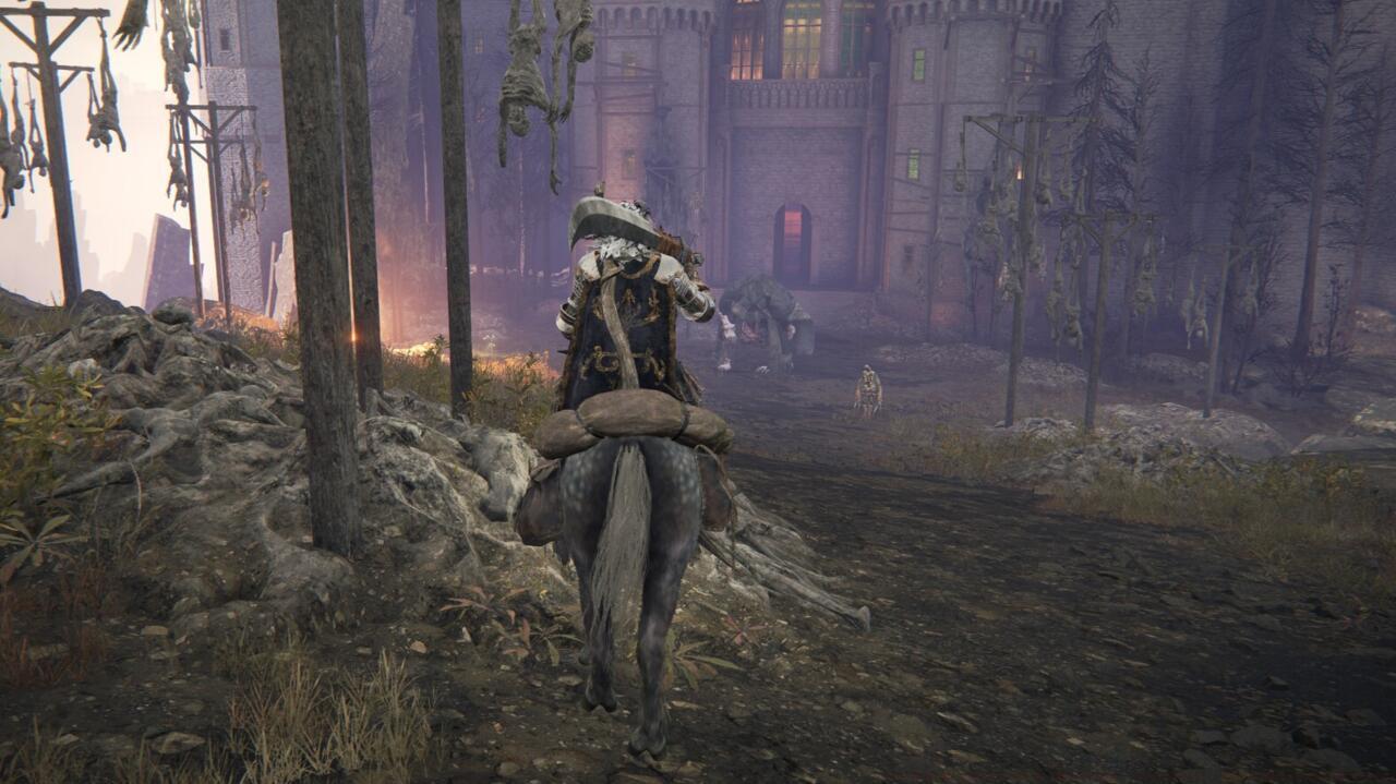 This troll looks scary, but you can run right by him and into the manor.