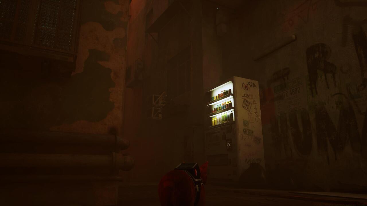 The second energy drink is against a wall in the back of the Slums.