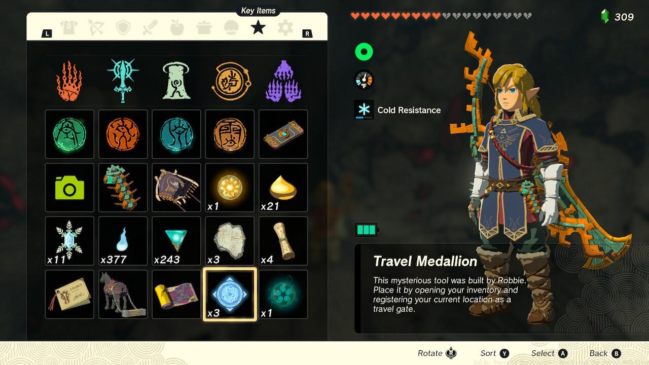 The Travel Medallion is in the key items tab.