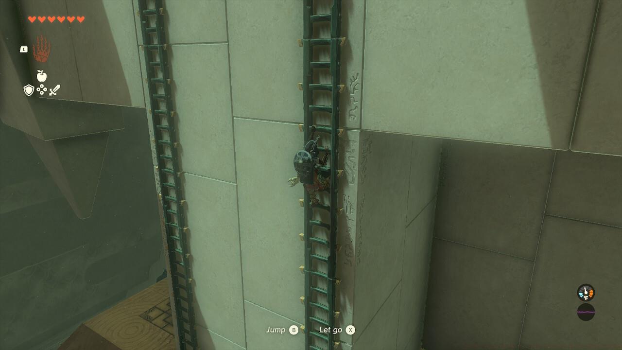 Climb either ladder to the top.