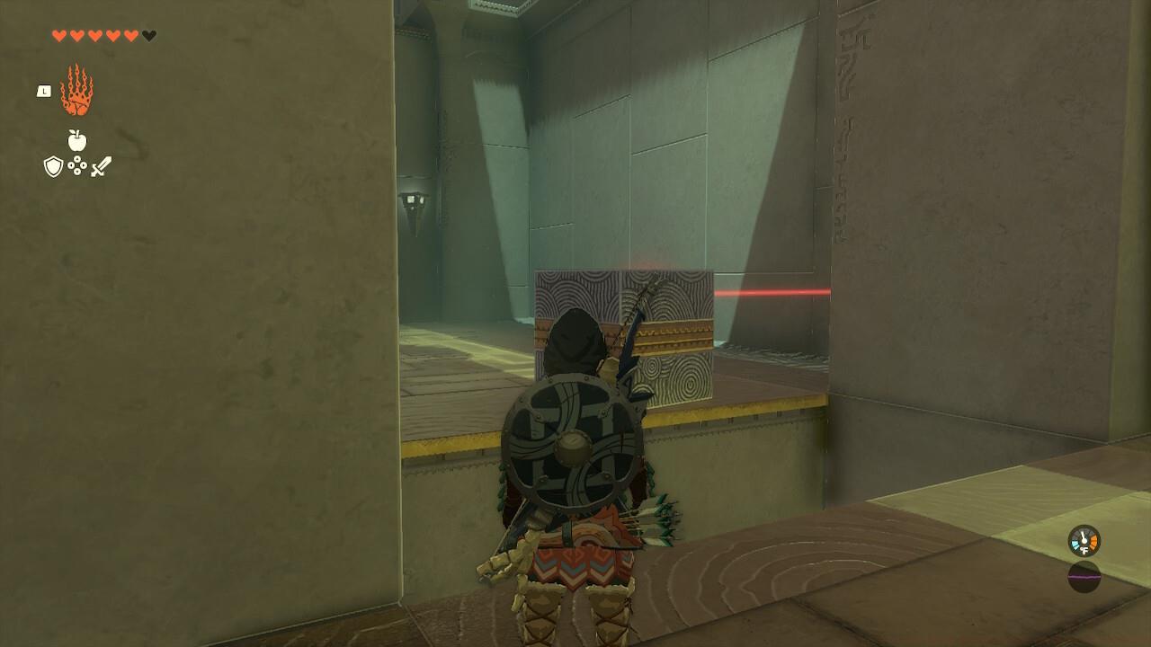 Use the cube to block the laser, opening the gate to a chest behind you.