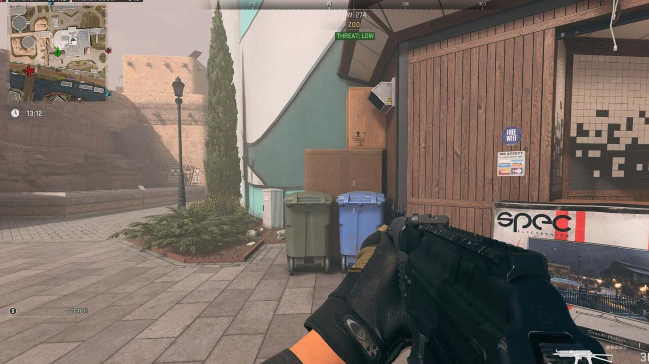 Mantle up on these trash cans to reach the rooftop