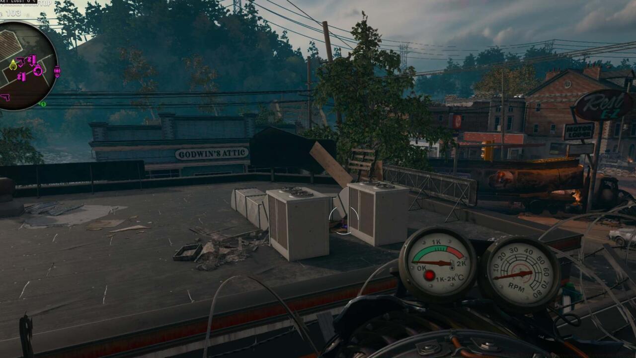 In between the SC units on the rooftop of the video store