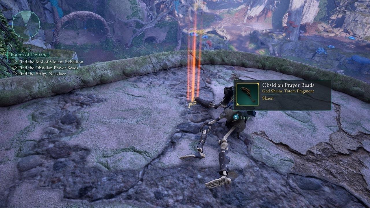 The Obsidian Prayer Beads are on this ledge overlooking the arena-like area.