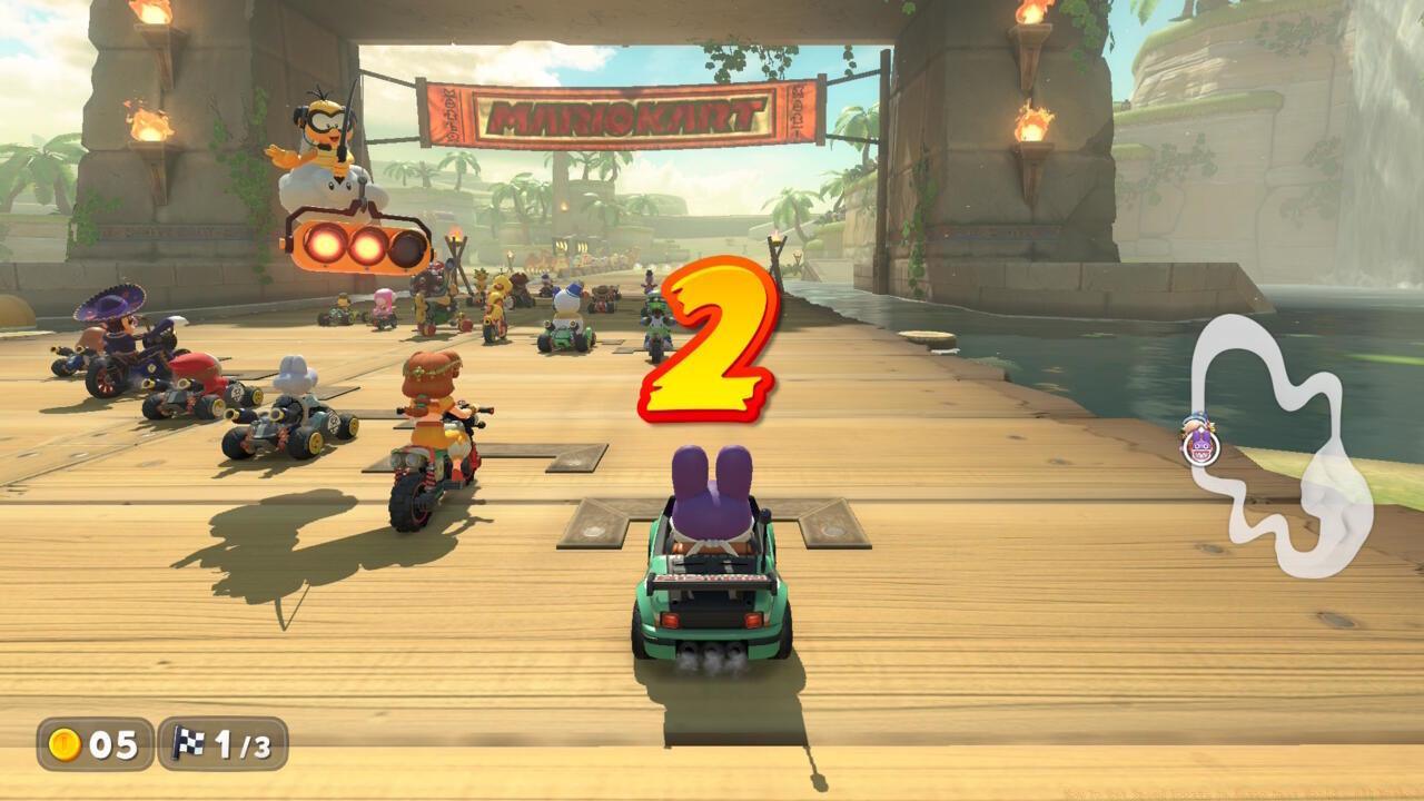 Press and hold the gas when 2 appears in the countdown.