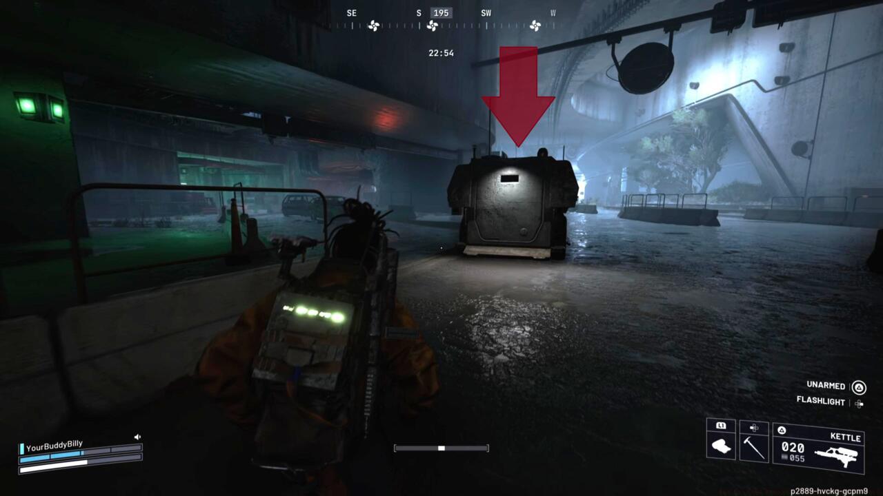 Unopened armored patrol cars have a light shining on their back door.