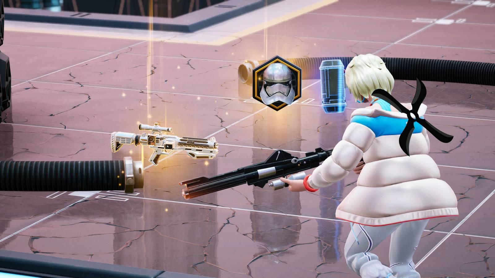 A Fortnite character approaches loot on the floor, including a special Star Wars medallion.