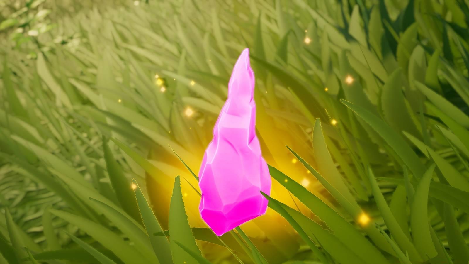 An image of Godzilla's Fragment, a pink crystal object, laying in Fortnite's grass.