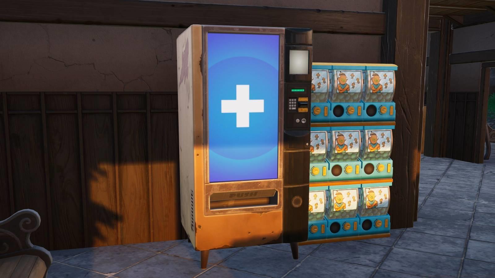 A vending machine with a white plus sign on the front beside a few Fishsticks gacha machines in Fortnite.