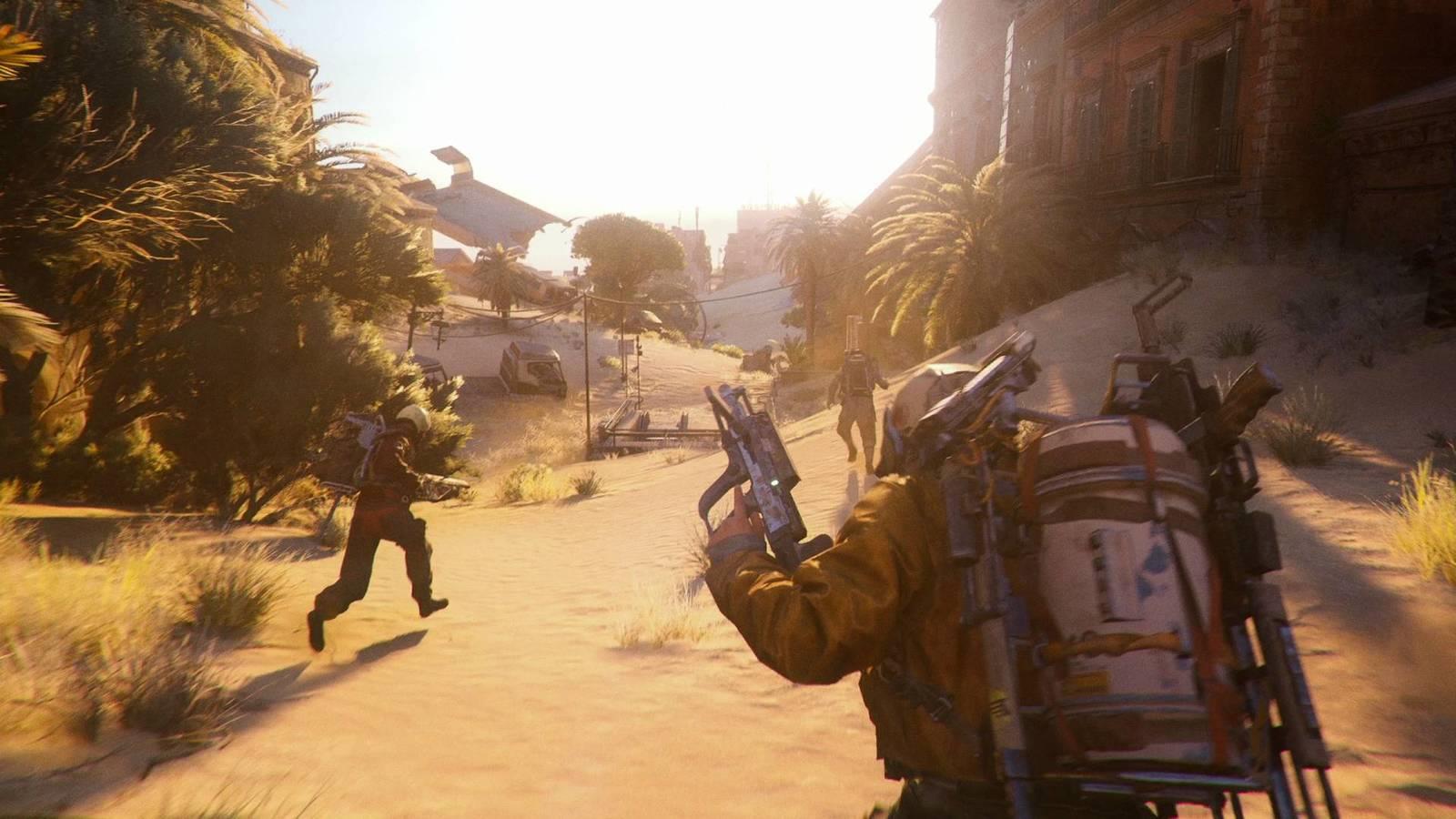 Three players in Arc Raiders running through Buried City.