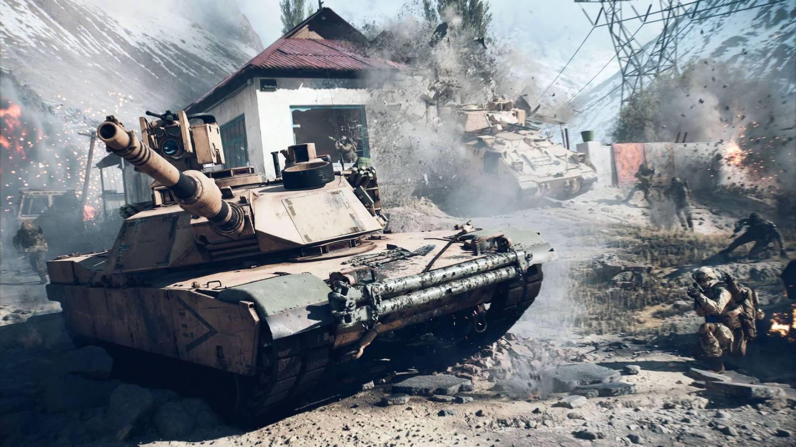 A tank in Battlefield 6 with soldiers crouched near it in the road while another tank crashes through a building in the background.