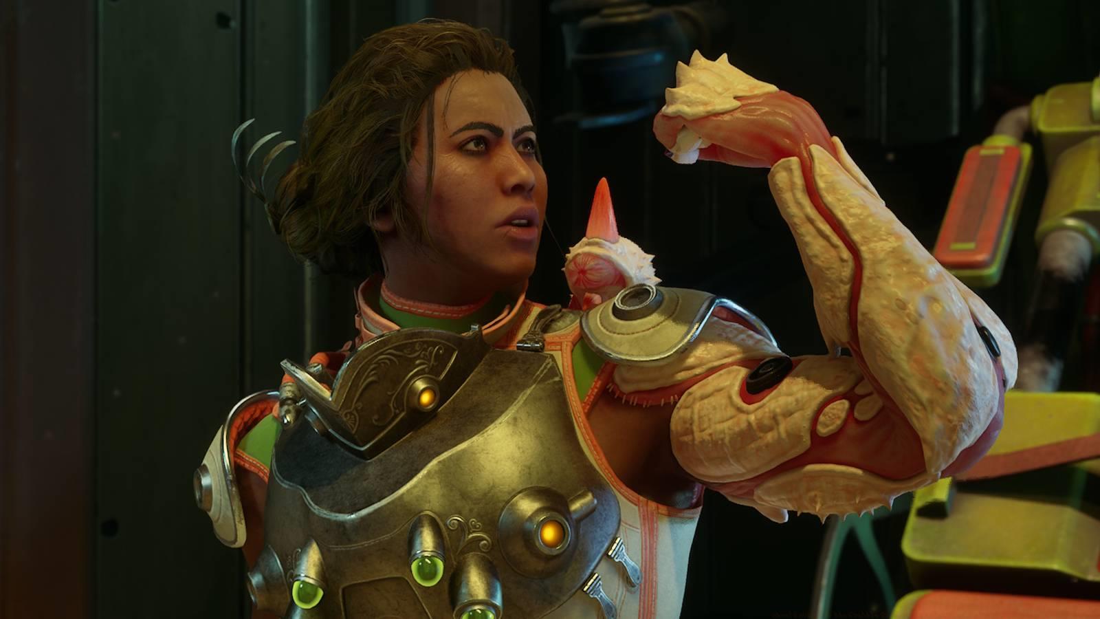 Inez flexing her crabble claw arm in Outer Worlds 2