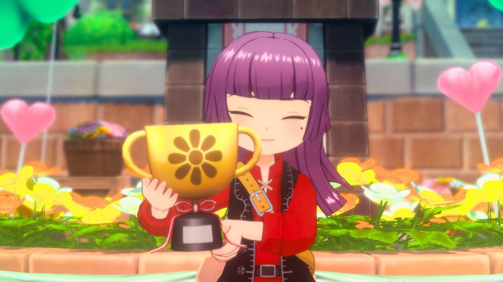 The protagonist wears a red and black outfit. She holds up a trophy, surrounded by flowers and smiling. A screenshot from Story of Seasons: Grand Bazaar.